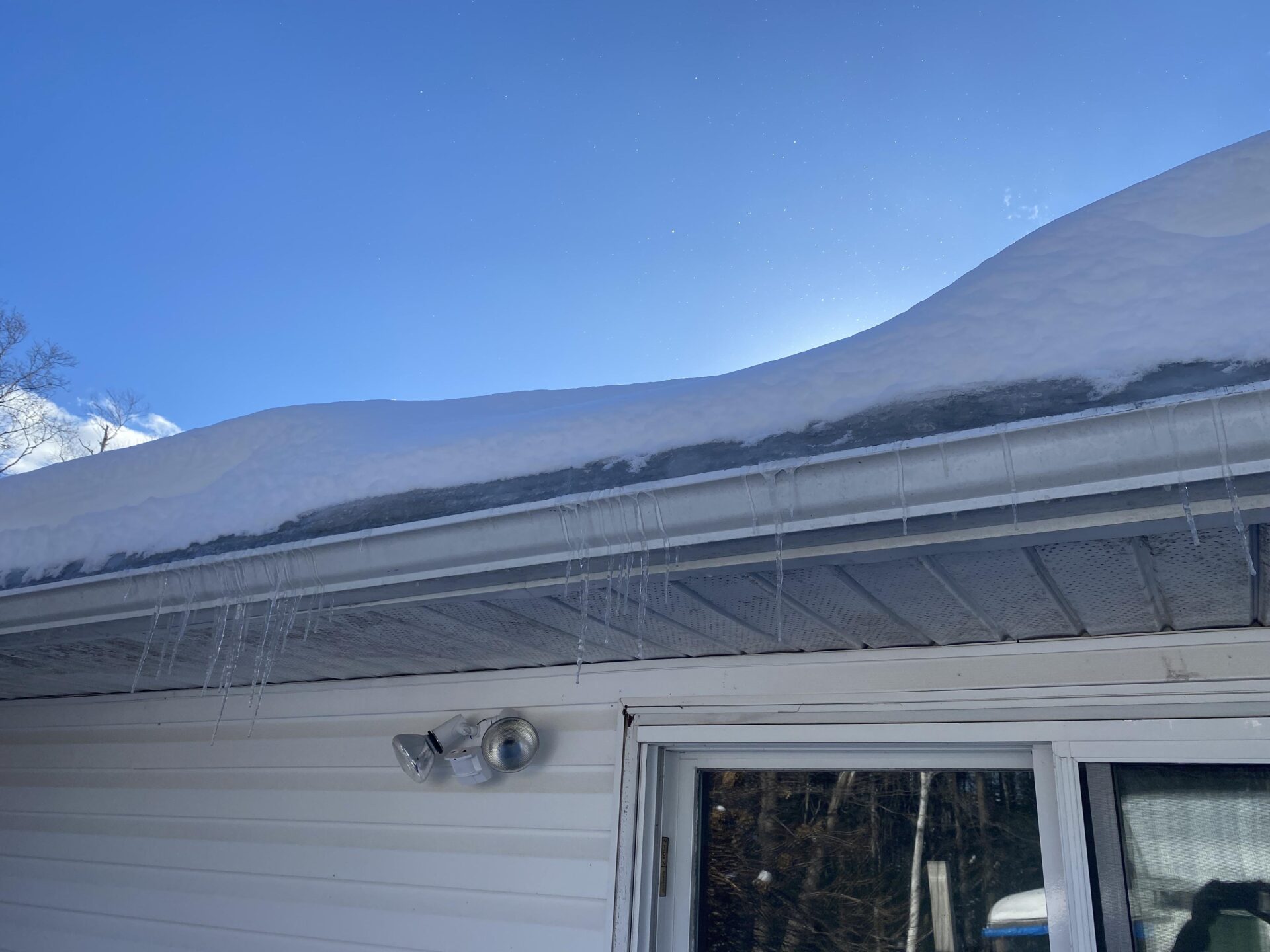 Heavy snow on gutters